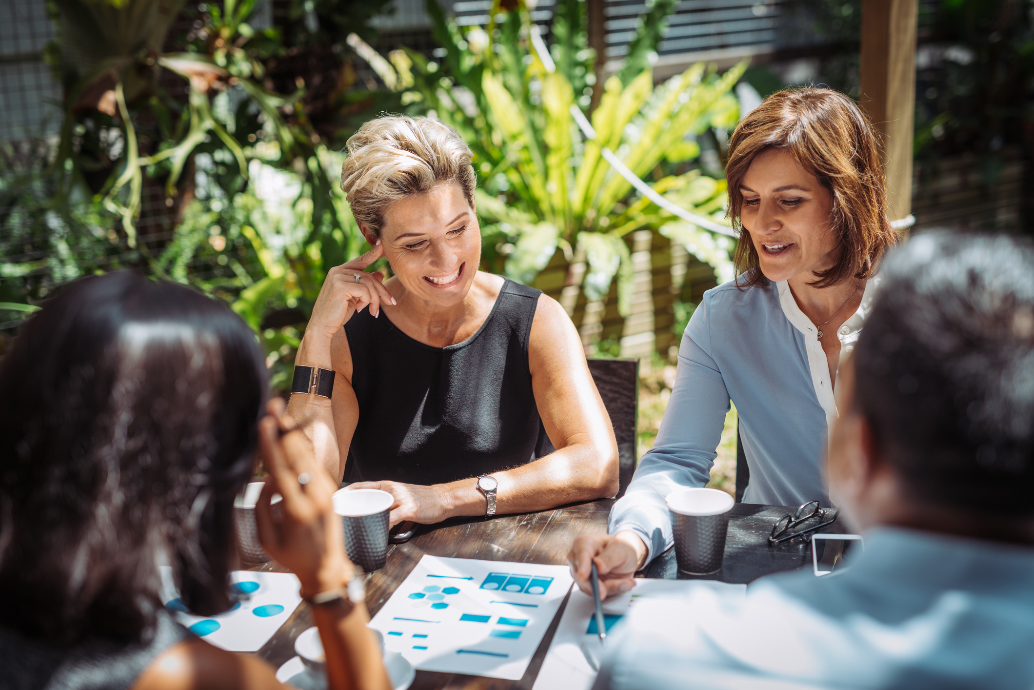 Businesswomen-discussing-priorities-and-strategies-936293578_2122x1416 (1)