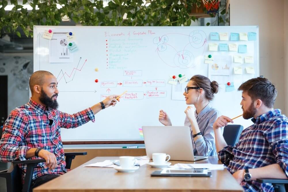 Group of business people working together in office